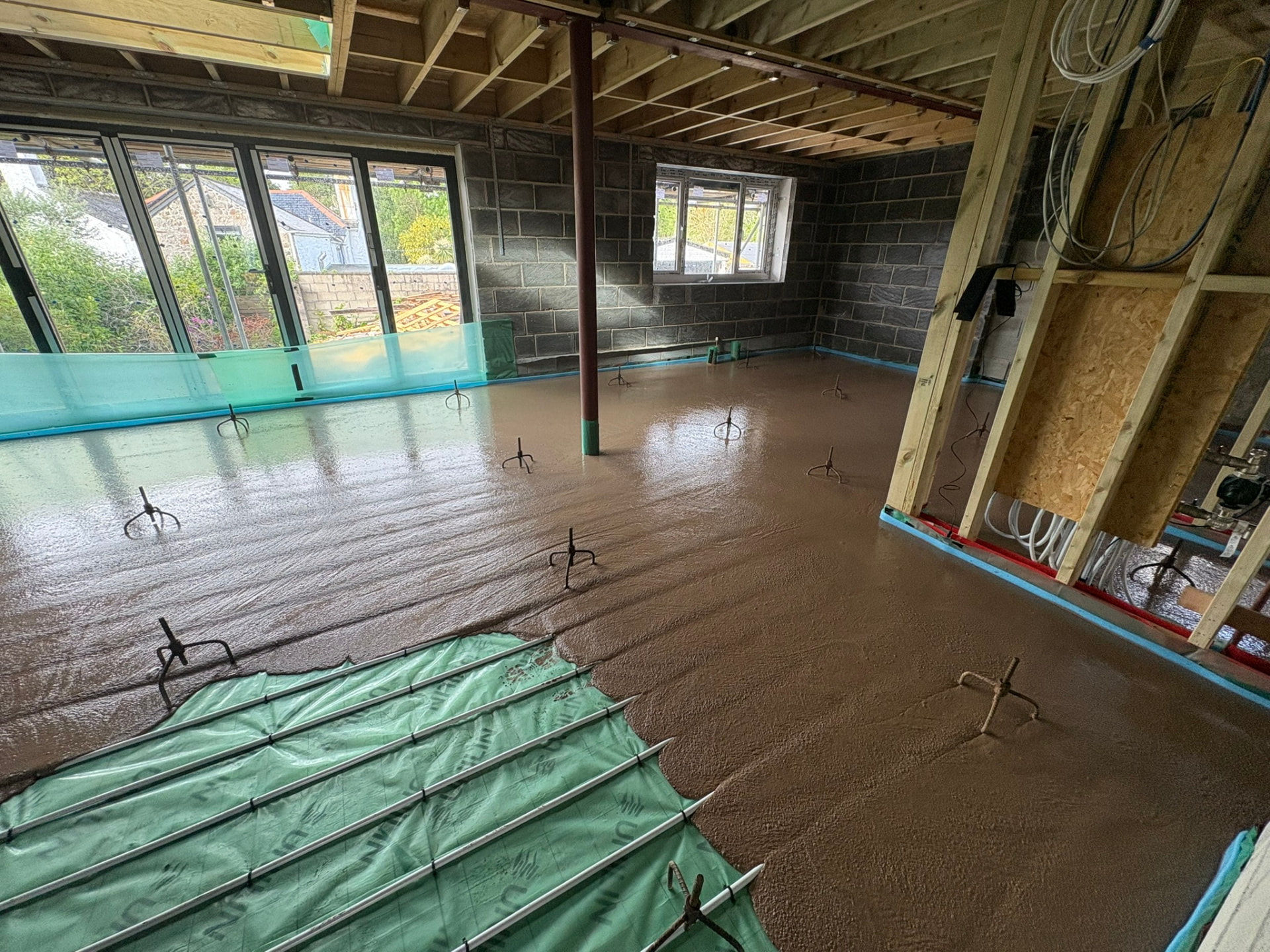 Newly prepared internal floor within the extended open-plan bungalow at 3 Polgoon Close in Penzance
